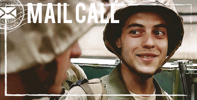 Snafu (a WWII U.S. Marine) smiles at Sledge (another WWII U.S. Marine).