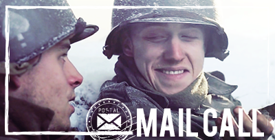 Mail Call: Babe and Roe One U.S. Paratrooper (circa WWII) smiles smugly over his shoulder at another in a snow-covered foxhole.